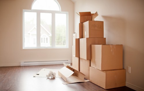 House removals planning in Brent with packing boxes ready