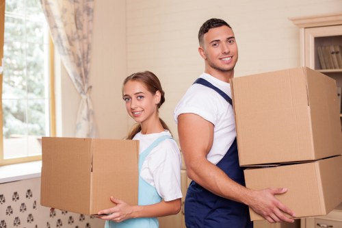 Packed boxes and furniture ready for self storage in Brent