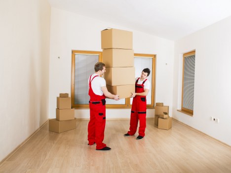 Organised packing materials and labelled boxes for Brent moving services